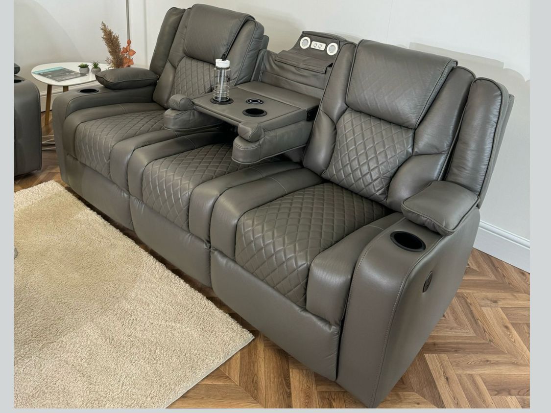 Close up of wireless charging pad and cup holders on Orlando Sofa