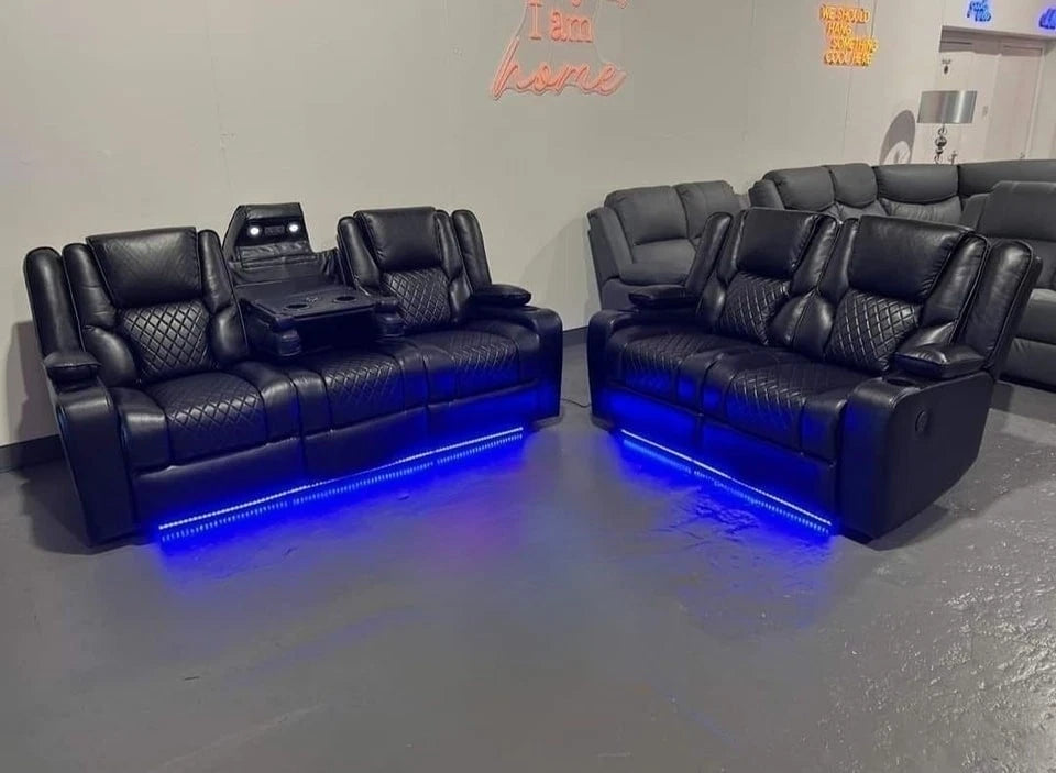 Modern black leather electric recliner sofa in reclining position